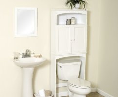 Что повесить на стену над бачком унитаза